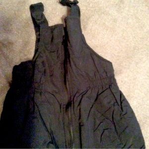 Children’s skiwear bib one piece black .. size 4-5. Nylon with elastic at ankle